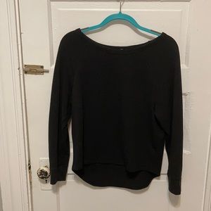 Small long sleeve black tee with cross shaped cutout